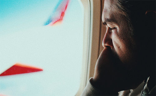 How to Survive a Long Flight in Coach