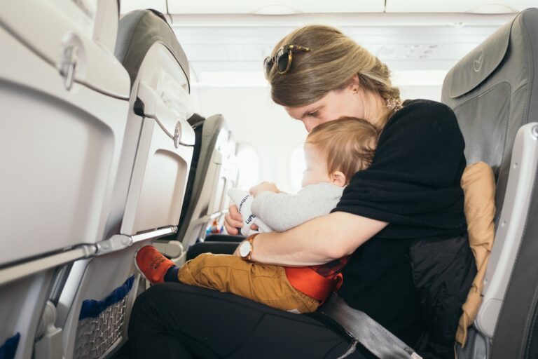 Mother and baby on airplane